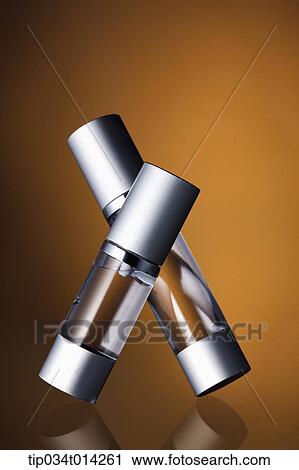 Stock Image - make up cases in brown background. Fotosearch