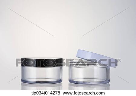 Stock Photo - make up cream case in white background. Fotosearch