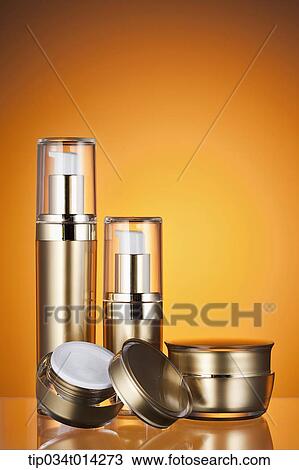Stock Image - make up set in brown background. Fotosearch