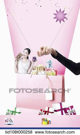 memo template featuring a shape of shopping bag with gifts View Large Photo Image Stock Photo - memo template featuring a shape of shopping bag with gifts . Fotosearch