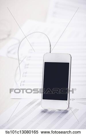 mobile phone on musical papers View Large Photo Image Stock Photography - mobile phone on musical papers. Fotosearch
