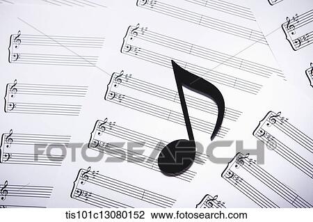 Stock Image - musical note on musical papers . Fotosearch