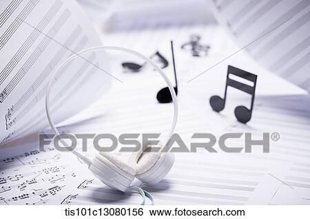 musical notes and headset on musical papers View Large Photo Image Stock Photograph - musical notes and headset on musical papers . Fotosearch