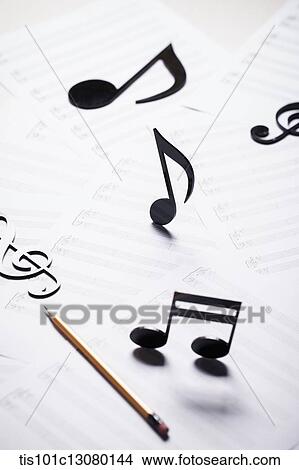 musical notes on musical papers View Large Photo Image Picture - musical notes on musical papers . Fotosearch