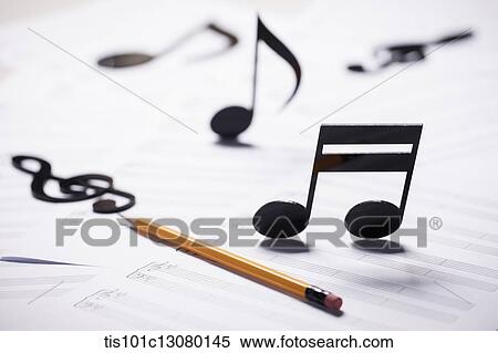 Stock Photography - musical notes on musical papers . Fotosearch