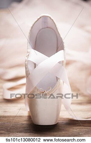 one ballet shoe on wooden floor View Large Photo Image Stock Image - one ballet shoe on wooden floor. Fotosearch