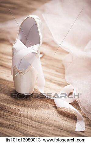 one ballet shoe on wooden floor View Large Photo Image Stock Image - one ballet shoe on wooden floor. Fotosearch