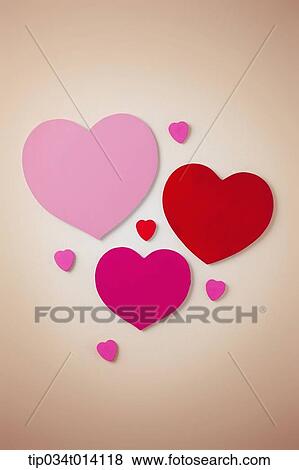 red and pink heart shapes in yellow background View Large Photo Image Stock Photo - red and pink heart shapes in yellow background . Fotosearch