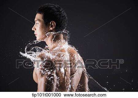side shot of a fit man in black background with water splash View Large Photo Image Stock Image - side shot of a fit man in black background with water splash. Fotosearch