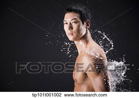 side shot of a fit man in black background with water splash View Large Photo Image Stock Image - side shot of a fit man in black background with water splash. Fotosearch