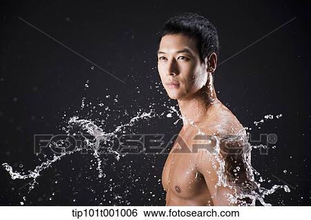 side shot of a fit man in black background with water splash View Large Photo Image Stock Photograph - side shot of a fit man in black background with water splash. Fotosearch