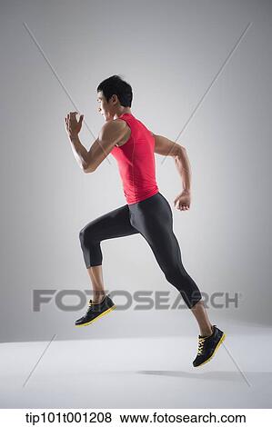 side shot of a runner running View Large Photo Image Stock Photo - side shot of a runner running. Fotosearch
