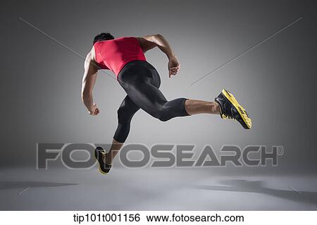 Stock Photograph - side shot of a runner running . Fotosearch