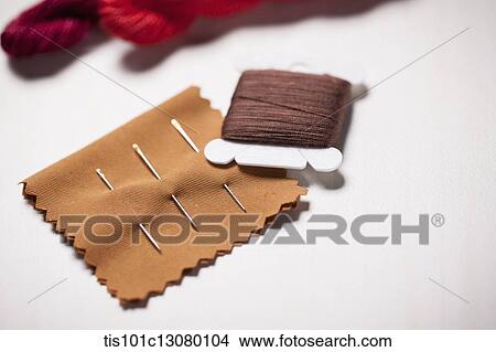stitching equipment on the floor View Large Photo Image Picture - stitching equipment on the floor. Fotosearch