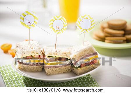 Stock Photo - three sandwiches on a plate. Fotosearch