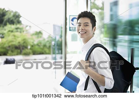 Stock Image - university students in the department building . Fotosearch