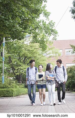 university students walking together in the campus View Large Photo Image Stock Image - university students walking together in the campus . Fotosearch