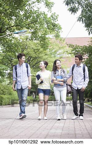 university students walking together in the campus View Large Photo Image Stock Image - university students walking together in the campus . Fotosearch