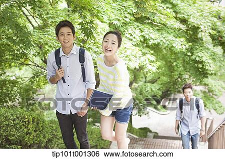 university students walking up the stairs together in the campus View Large Photo Image Stock Photograph - university students walking up the stairs together in the campus . Fotosearch