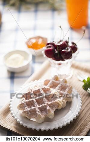waffles and cherries on a tray View Large Photo Image Picture - waffles and cherries on a tray. Fotosearch
