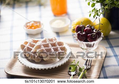 waffles and cherries on a tray View Large Photo Image Stock Image - waffles and cherries on a tray. Fotosearch