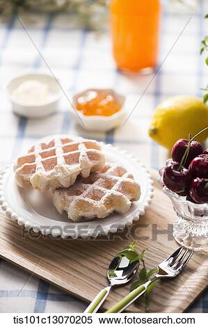 waffles and cherries on a tray View Large Photo Image Stock Photography - waffles and cherries on a tray. Fotosearch
