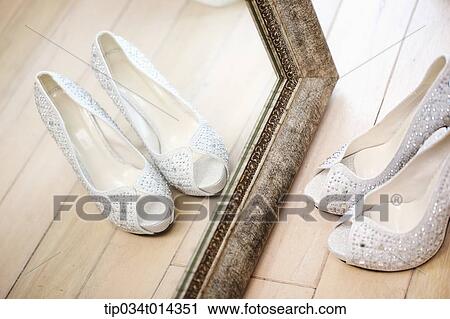wedding heels in front of a mirror View Large Photo Image Stock Image - wedding heels in front of a mirror. Fotosearch