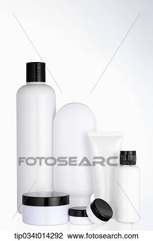 Stock Image - white make up set in white background. Fotosearch