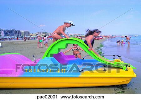 Stock Image - child, seaside, summer, vacation, boat, pleasure, sand. Fotosearch