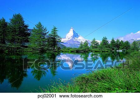 Stock Image - mountain, landscape, lake, tree, river, Swiss. Fotosearch