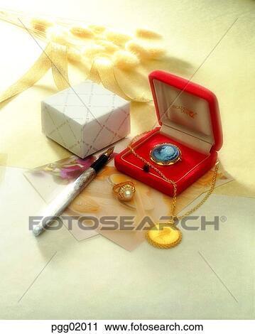 pearl, medal, necklace, pearlring, necklace, ring, fountain pen View Large Photo Image Stock Image - pearl, medal, necklace, pearlring, necklace, ring, fountain pen. Fotosearch
