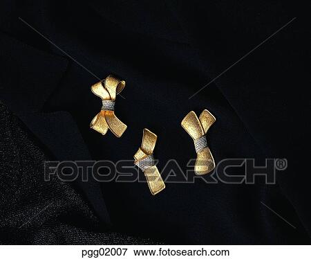 ribbonbrooch, ribbon, brooch, jewel, jewelry, accessories View Large Photo Image Stock Photo - ribbonbrooch, ribbon, brooch, jewel, jewelry, accessories. Fotosearch