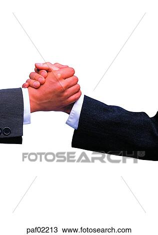Stock Image - hand, handshake, business man, business, greeting, industry. Fotosearch