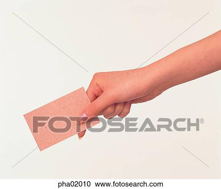 Stock Image - hand, name card, paper, hand, business. Fotosearch