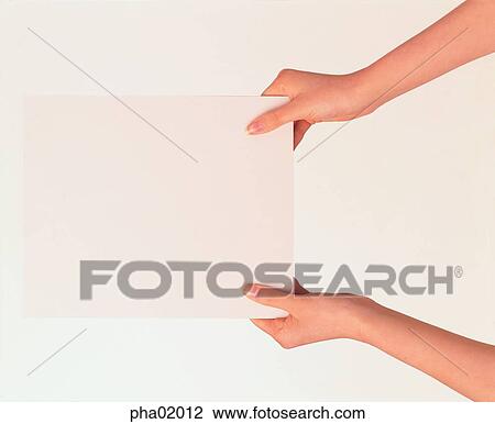 Stock Image - hand, paper, A4, hand, business. Fotosearch