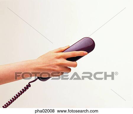 Stock Photo - hand, telephone, phone, communication, hand, business. Fotosearch