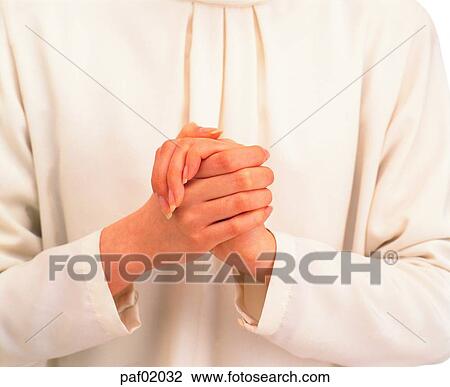 Stock Image - two hands, hand, finger, arm, pray. Fotosearch