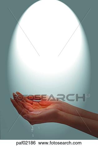 Stock Photograph - two hands, hands, palm, hand, light, water. Fotosearch