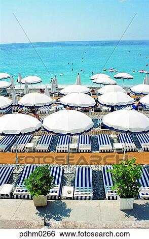 Nice, France, playground, parasol, beachchair, beach, sea View Large Photo Image Stock Photograph - Nice, France, playground, parasol, beachchair, beach, sea. Fotosearch