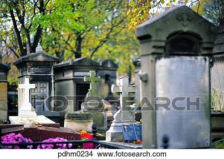 Picture - Pere Lachaise, graveyard, monument, tombstone, Cross, decoration, sky. Fotosearch