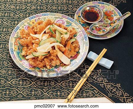 Stock Photo - sweet and sour pork, meat, fruits, source, fritters, oil, Chinese food. Fotosearch