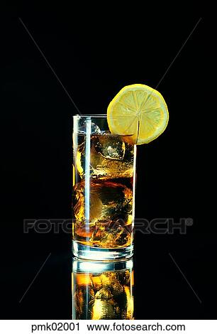 Stock Image - whisky, liquor, liquor, drinks, beverage, ice, lemon. Fotosearch