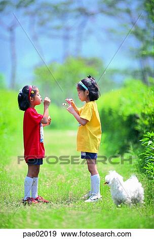 child, bubble, puppy, girl, Oriental people, friend, sister View Large Photo Image Stock Photo - child, bubble, puppy, girl, Oriental people, friend, sister. Fotosearch