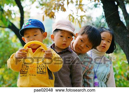 child, friend, childrens, human, outdoor, oriantal, kid View Large Photo Image Stock Photo - child, friend, childrens, human, outdoor, oriantal, kid. Fotosearch
