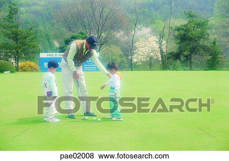 Stock Photo - golf, child, father, boys, children, lesson, golf lesson. Fotosearch