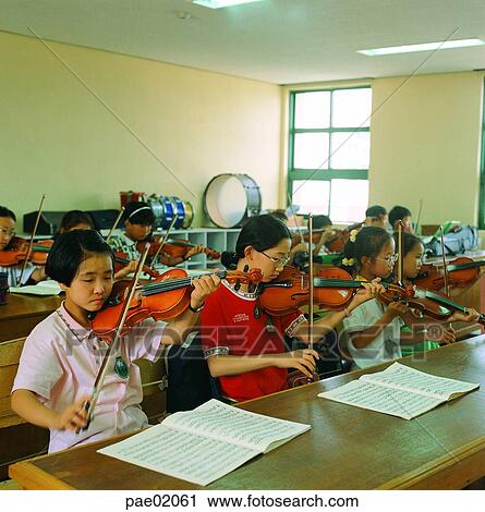 Stock Image - violin, musictime, music, concert, child, classroom, human. Fotosearch