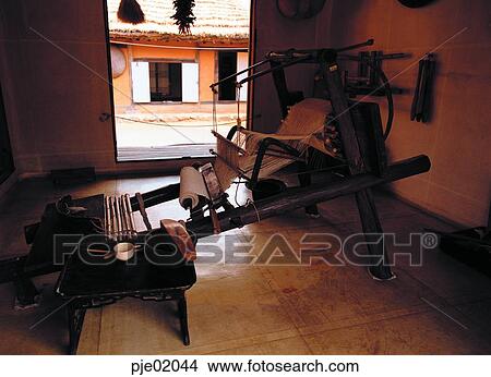 clothes, loom room, folk tool, living implements, living articles, house, traditional house View Large Photo Image Picture - clothes, loom room, folk tool, living implements, living articles, house, traditional house. Fotosearch