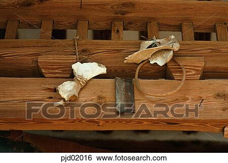 Stock Photograph - eaves, charm, born, ring, iron ring, tree, wooden materials. Fotosearch