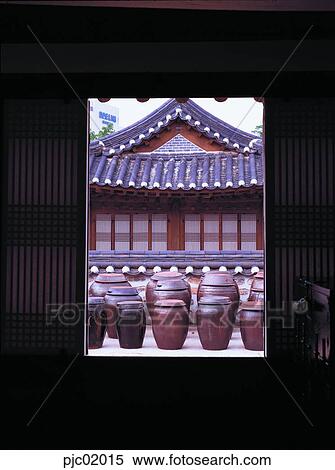 Stock Photography - jar, tiled house, fence, door, frame of a paper sliding door, house, traditional house. Fotosearch
