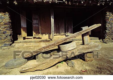 mortar, mill, living implements, folk tool, living articles, house, traditional house View Large Photo Image Stock Image - mortar, mill, living implements, folk tool, living articles, house, traditional house. Fotosearch